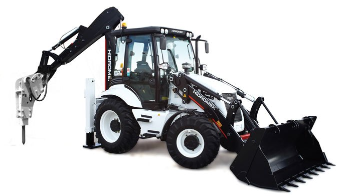 Экскаватор‑погрузчик с гидромолотом #1